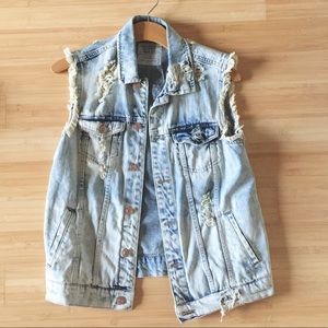 Distressed denim vest